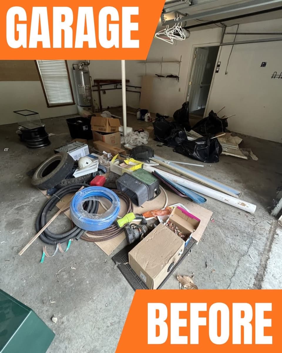 Left garage bay packed with years of accumulation before cleanout